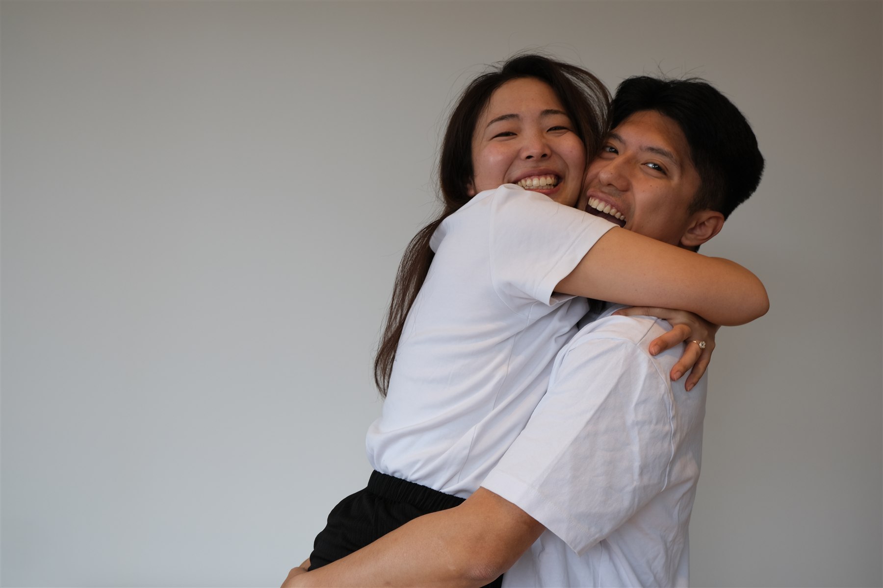 Shawn and Hitomi embracing