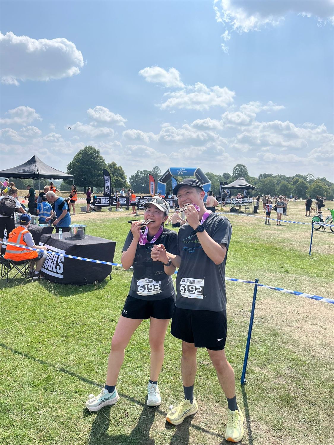 Shawn and Hitomi eating snacks after a race
