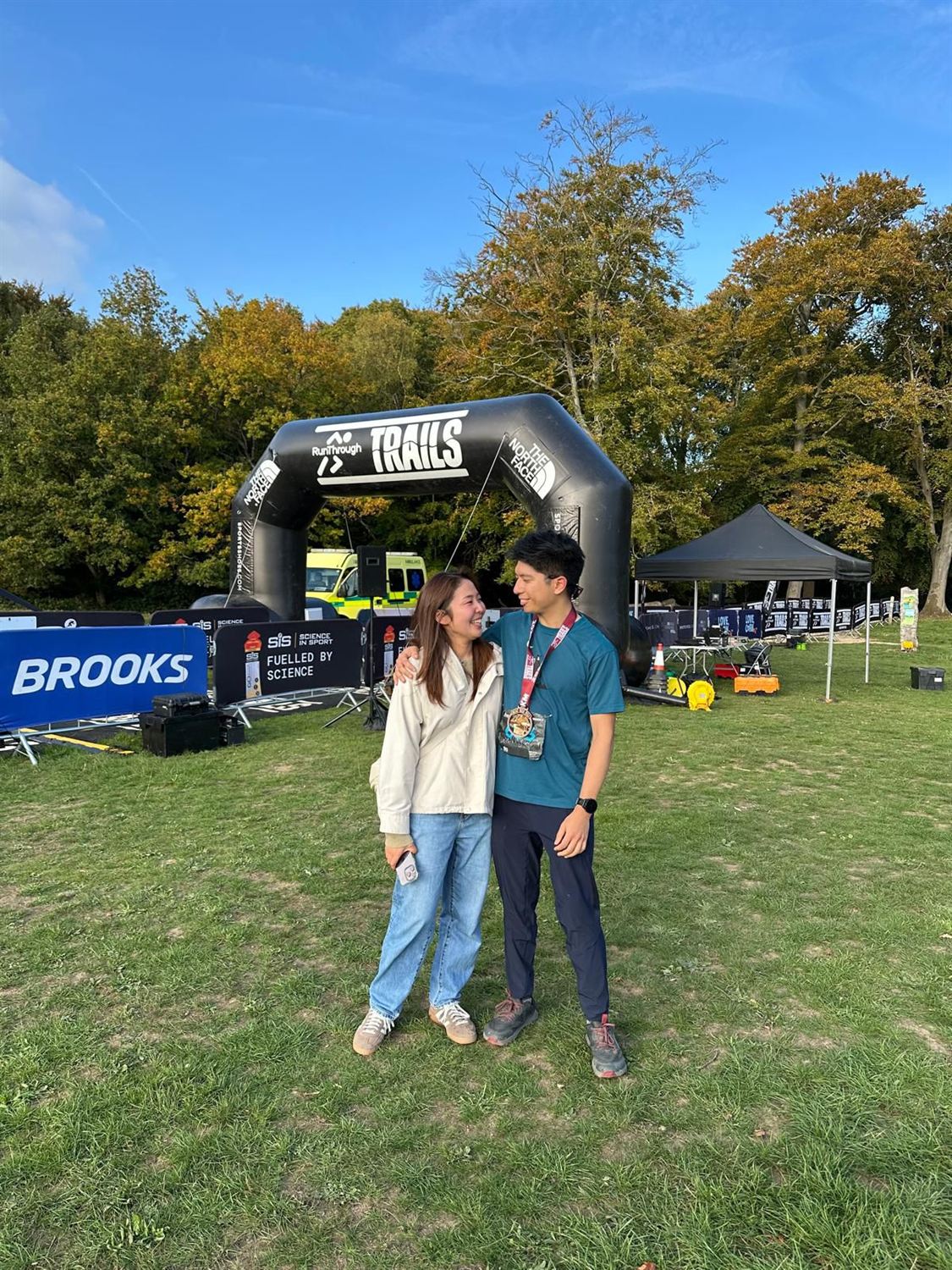 Shawn and Hitomi standing together after finishing a trail run